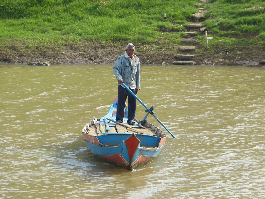 Crossing the river the old fashioned way in Battambang