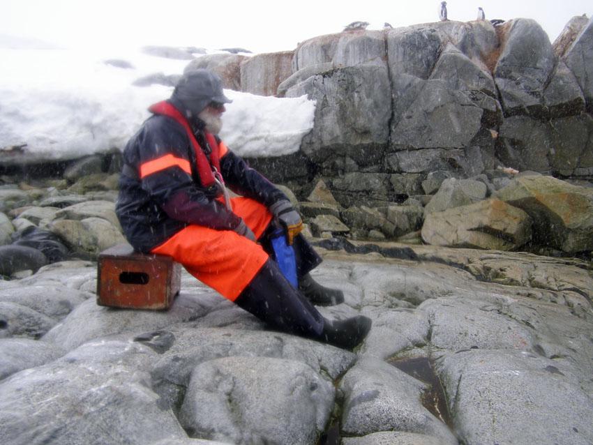 Pierre guarding the supplies in Antarctica